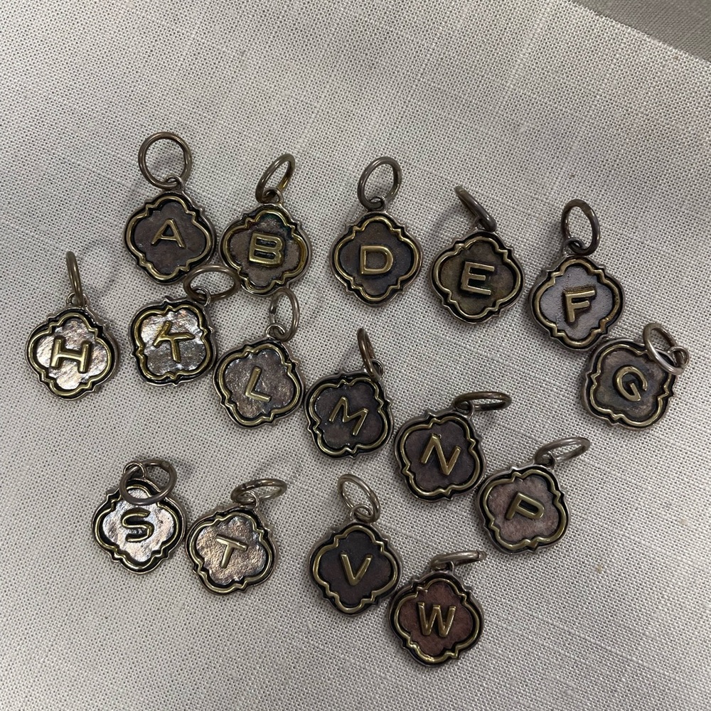 Waxing Poetic. Quatrefoil Insignia Charms
